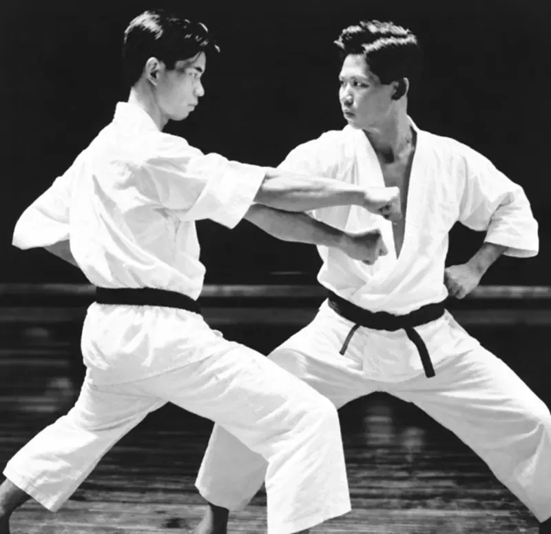 Shigeru Egami low sweeping parry against Yoshitaka Funakoshi straight punch
